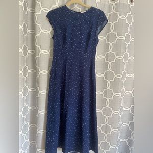 Women’s size small, navy, and white polka dot dress. NWT..